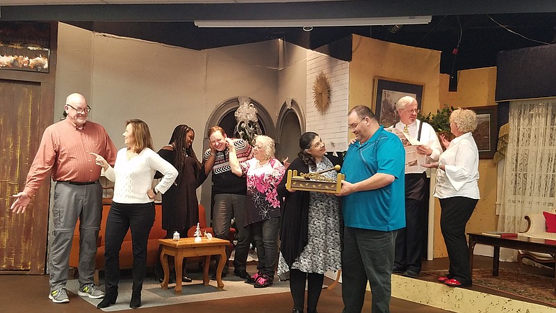 "The ReGifters," which opens Friday at Oak Street Playhouse, features, from left, Jim Lansing, Carol Doucette, Kashun Parks, Michael Myers, Denise Frye, Kathryn Kropp, Ron King, Phil Elkins and Tammy Rice. (Oak Street Playhouse contributed photo)