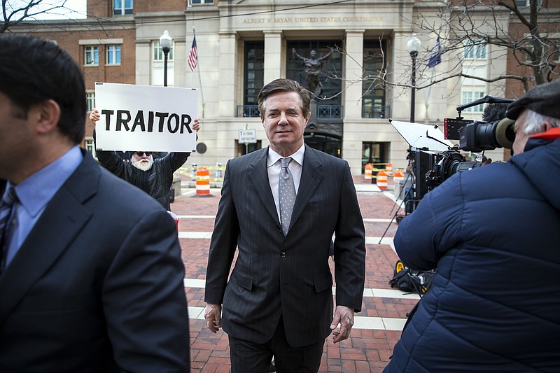 Paul Manafort, President Donald Trump's former campaign chairman, leaves the federal courthouse after his arraignment hearing in Alexandria, Va., last March on charges for tax evasion and bank fraud. (Al Drago/The New York Times)