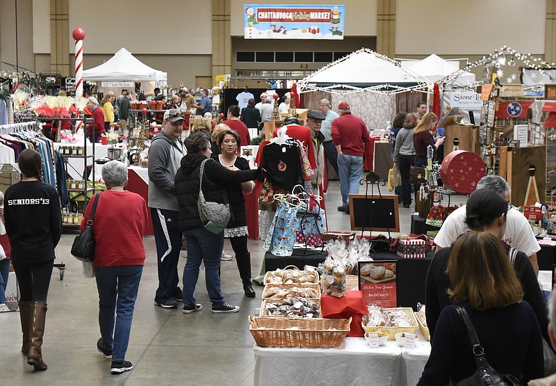 Shoppers fill aisles at a previous Chattanooga Holiday Market in the Chattanooga Convention Center.