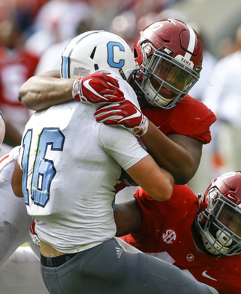 Alabama redshirt sophomore defensive tackle Quinnen Williams stuffs The Citadel quarterback Brandon Rainey during the Crimson Tide's 50-17 win on Nov. 17.