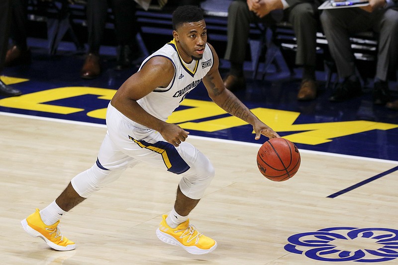 UTC guard Jerry Johnson Jr. (2) drives down the court against Hiwassee during a NCAA basketball game at McKenzie Arena on the campus of the University of Tennessee at Chattanooga on Tuesday, Nov. 27, 2018 in Chattanooga, Tenn.