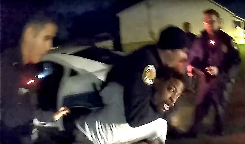 This screenshot of the footage taken by a police bodycam shows the moment when an East Ridge police officer wrapped his arm around Christopher Penn's neck in an attempt to subdue him during an Oct. 21, 2018, arrest. Critics have called the move excessive and a potentially deadly use of force. Police maintain the officer used a "lateral vascular neck restraint," which does not restrict a person's ability to breathe and is considered safer than a traditional chokehold.