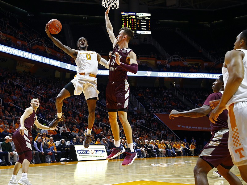 Tennessee guard Jordan Bone shoots over Eastern Kentucky forward Lachlan Anderson during the first half of Wednesday night's game in Knoxville. The sixth-ranked Vols rolled to a 95-67 victory.