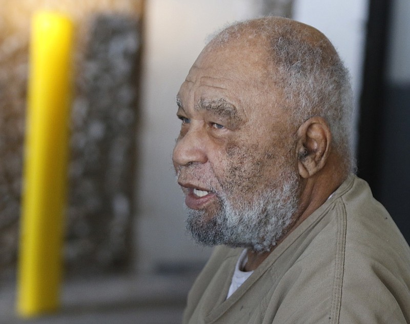 Samuel Little, who often went by the name Samuel McDowell, leaves the Ector County Courthouse after attending a pre-trial hearing Monday, November 26, 2018, in Odessa, Texas. McDowell was convicted of three murders, but now claims that he was involved in approximately 90 killings nationwide. Investigators already have corroborated about a third of those, a Texas prosecutor said. (Mark Rogers/Odessa American via AP)