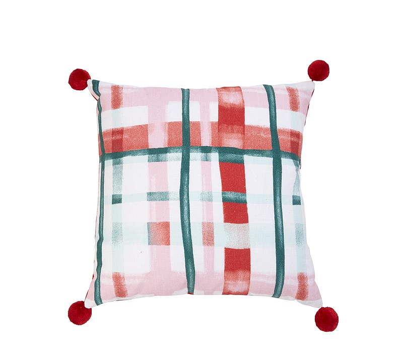 This undated photo shows a pillow available at Target. These Opalhouse toss pillows bring in some fresh, festive berry and candy hues to holiday décor. (Target via AP)