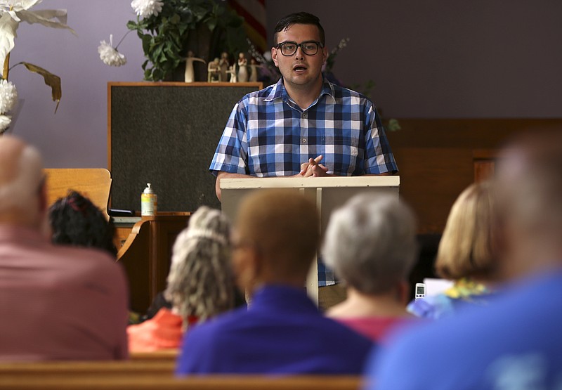 UnifiED Executive Director Jonas Barriere speaks on the APEX, or Action Plan for Educational Excellence, initiative during the Unity Group of Chattanooga's State of Education in Hamilton County Forum at Eastdale Village United Methodist Church on Aug. 6, 2017.