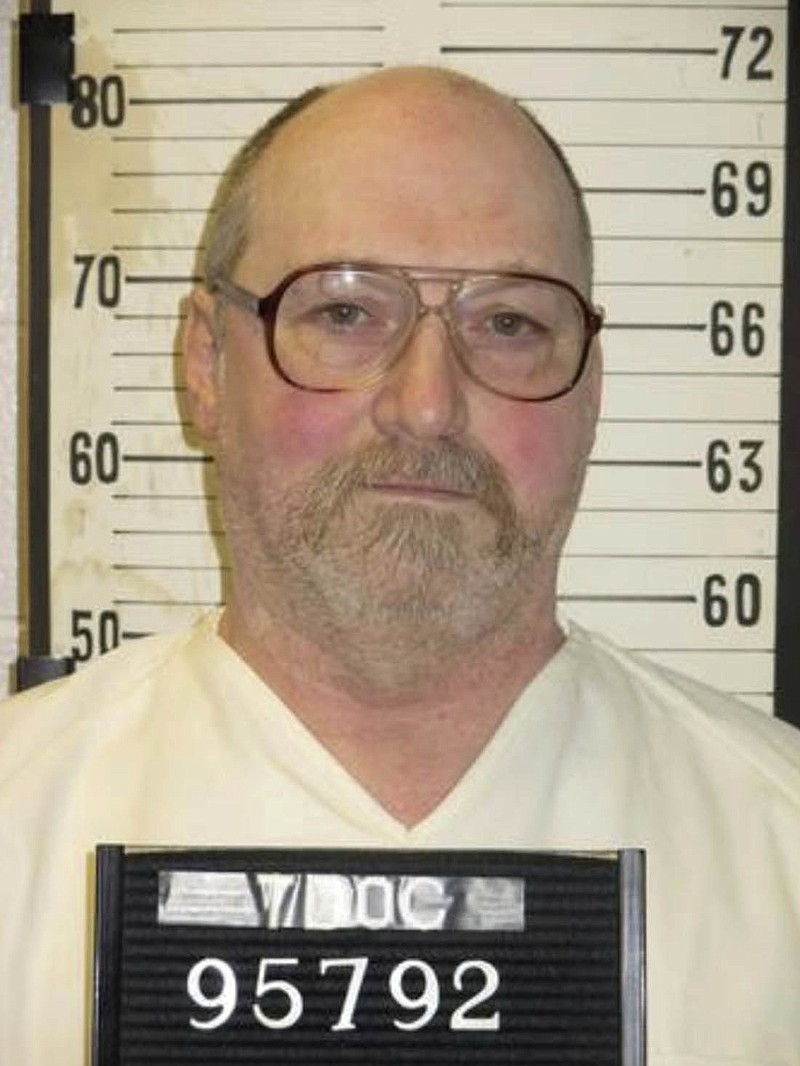 This undated photo provided by the Tennessee Department of Correction shows inmate David Earl Miller in Nashville, Tenn. Miller is requesting to die in the electric chair rather than by lethal injection. Lawyers for Miller have argued that Tennessee's midazolam-based injection method causes excruciating pain. A court filing on Monday says Miller has chosen electrocution for his Dec. 6 execution. (Tennessee Department of Correction via AP)