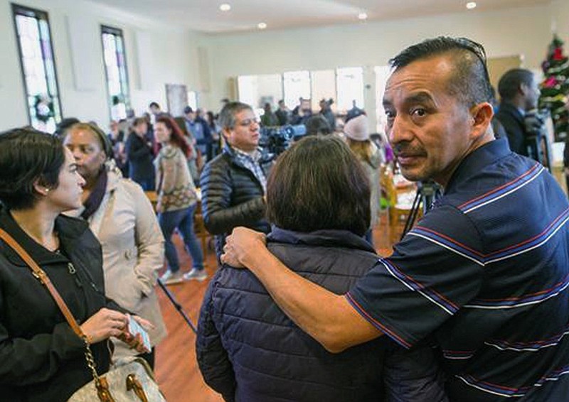 FILE - In this Dec. 13, 2017, file photo, Samuel Oliver-Bruno glances back before preparing for interviews after a news conference at CityWell United Methodist Church in Durham, N.C. Federal authorities said Thursday, Nov. 29, 2018, that Oliver-Bruno, a Mexican immigrant who sought refuge in the North Carolina church for nearly a year, has been deported. (Casey Toth/The Charlotte Observer via AP, File)

