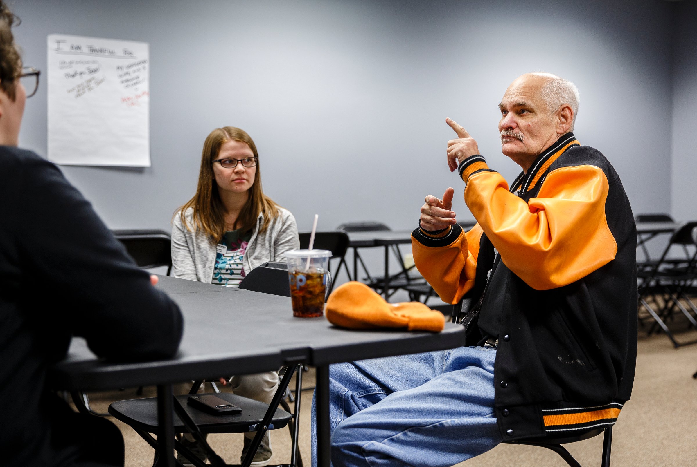 Todd Barksdale, right, talks about himself with Client Services Coordinator Neressa Snare at the Partnership for Families, Children and Adults on Thursday, Nov. 29, 2018, in Chattanooga, Tenn. Mr. Barksdale received aid from the Neediest Cases Fund to help repair his truck after dedicating years of his own service to the Partnership for Families, Children and Adults' Services for the Deaf and Hard of Hearing program.