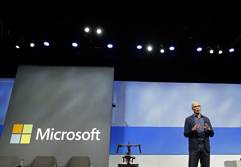 FILE- In this Wednesday, Nov. 28, 2018, file photo Microsoft CEO Satya Nadella speaks during the annual Microsoft Corp. shareholders meeting in Bellevue, Wash. Microsoft on Friday, Nov. 30, surpassed Apple as the world's most valuable publicly traded company. Under Nadella Microsoft has found stability by moving away from its flagship Windows operating system and focusing on cloud-computing services with long-term business contracts. (AP Photo/Ted S. Warren, File)