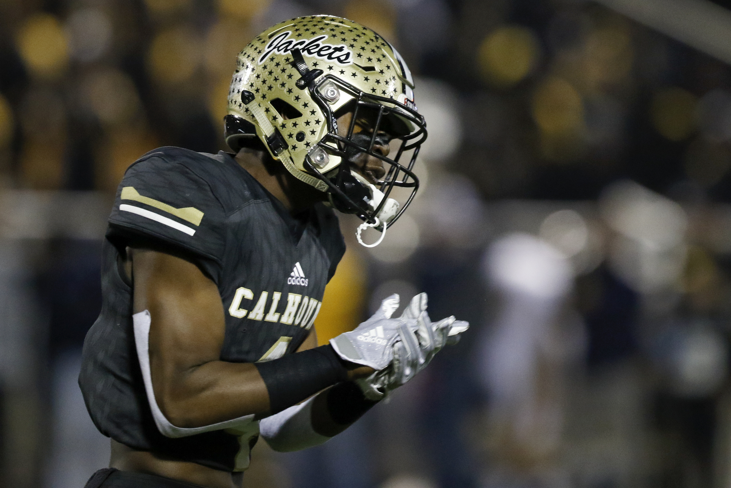 Calhoun's Bralin Barton (4) reacts after Peach County converted a third down during the GHSA Class AAA semifinals at Phil Reeve Stadium on Friday, Nov. 30, 2018 in Calhoun, Ga.