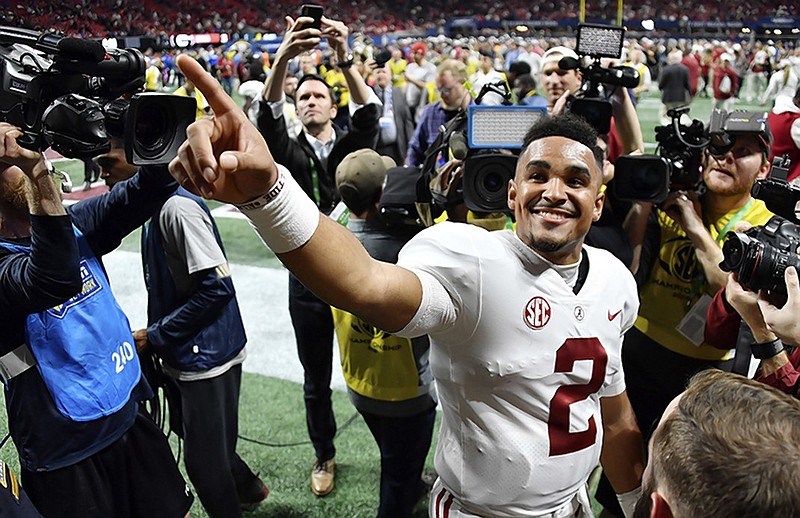 Alabama backup quarterback Jalen Hurts speaks to fans after leading the Crimson Tide to a comeback victory against Georgia in the SEC championship game Saturday at Mercedes-Benz Stadium in Atlanta.