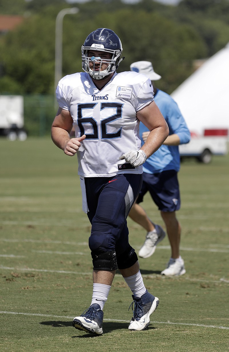 Tennessee Titans offensive lineman Corey Levin runs to a drill during training camp in July in Nashville. Levin is a former UTC standout who was drafted by the Titans in 2017.