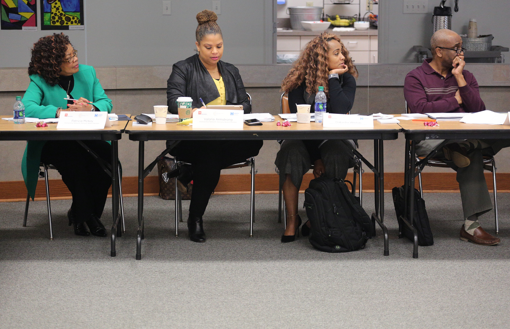 Partnership Network Advisory Board members Patricia McKoy, Valoria Armstrong, Dakasha Winton and Wayne Brown listen to Sharon Griffin, the deputy commissioner for school turnaround in Tennessee, during a workshop Monday, December 3, 2018 at the Hamilton County Schools Board of Education office in Chattanooga, Tennessee.