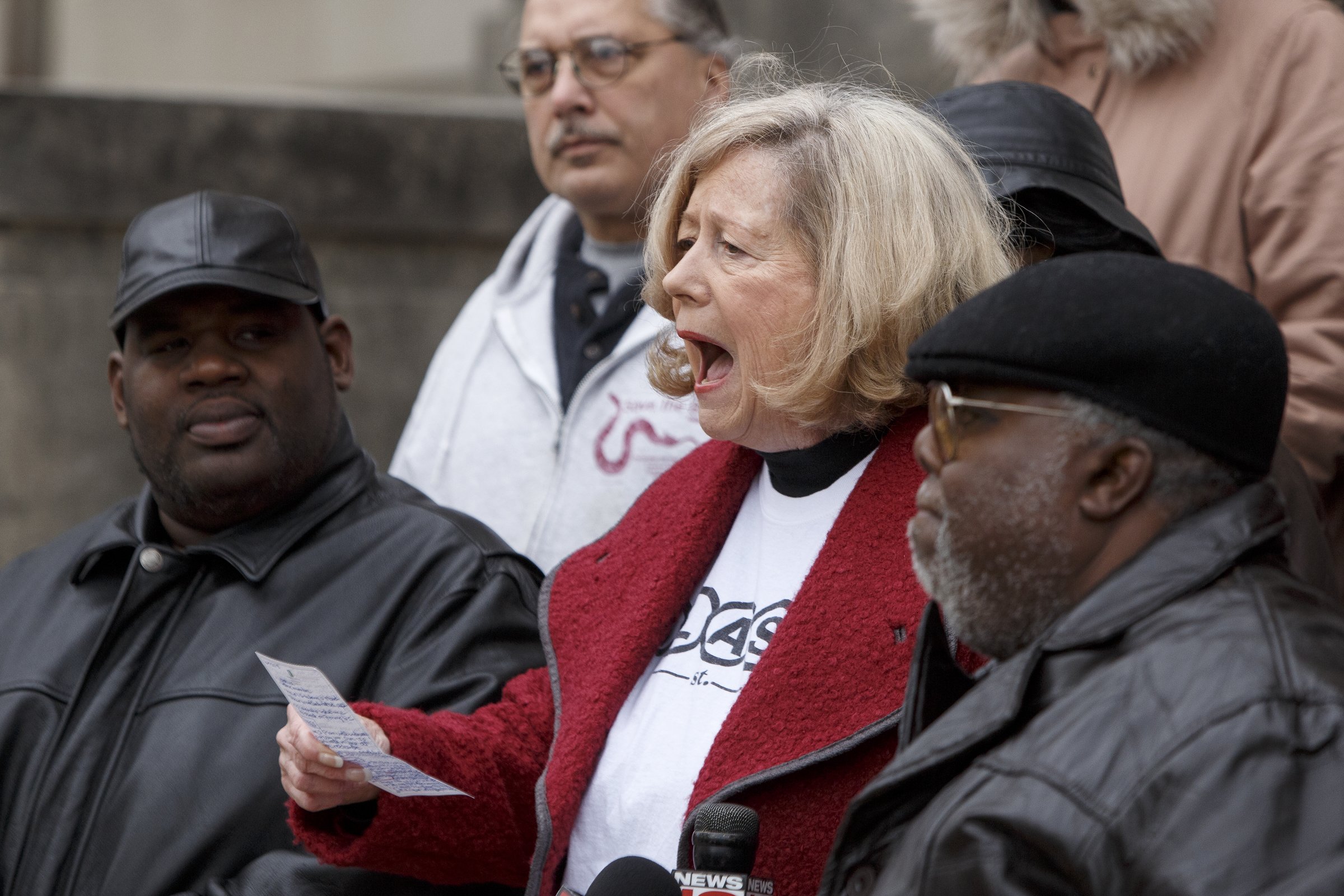 Unity Group of Chattanooga member and founder of Accountability for Taxpayer Money Helen Burns Sharp, red jacket, speaks during a public statement by the Unity Group of Chattanooga about the former Harriet Tubman site on the steps of City Hall on Tuesday, Dec. 4, 2018 in Chattanooga, Tenn.