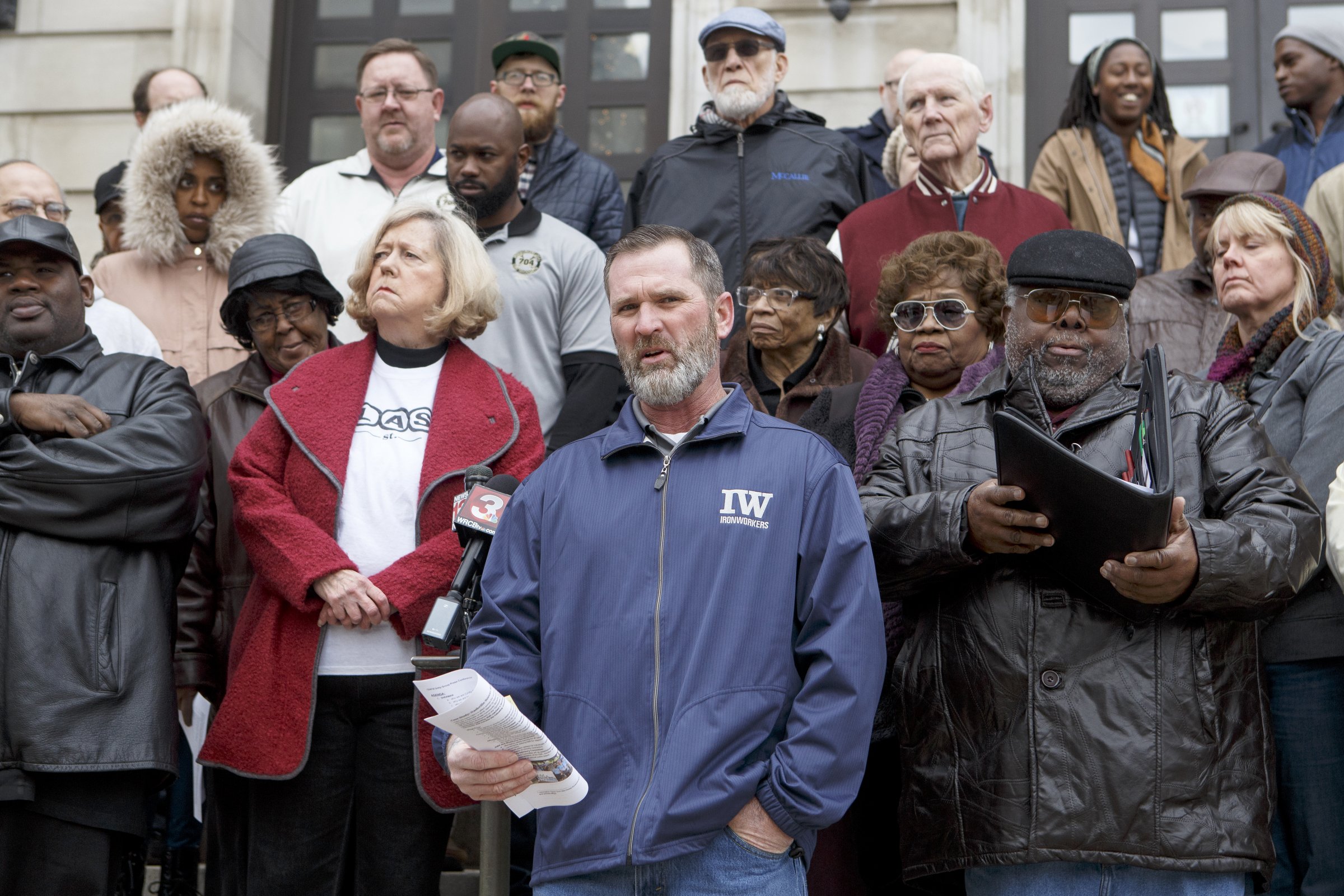 Organizer and President of Iron Workers Local Union No. 704 Daniel Potter, center, speaks during a public statement by the Unity Group of Chattanooga about the former Harriet Tubman site on the steps of City Hall on Tuesday, Dec. 4, 2018 in Chattanooga, Tenn.