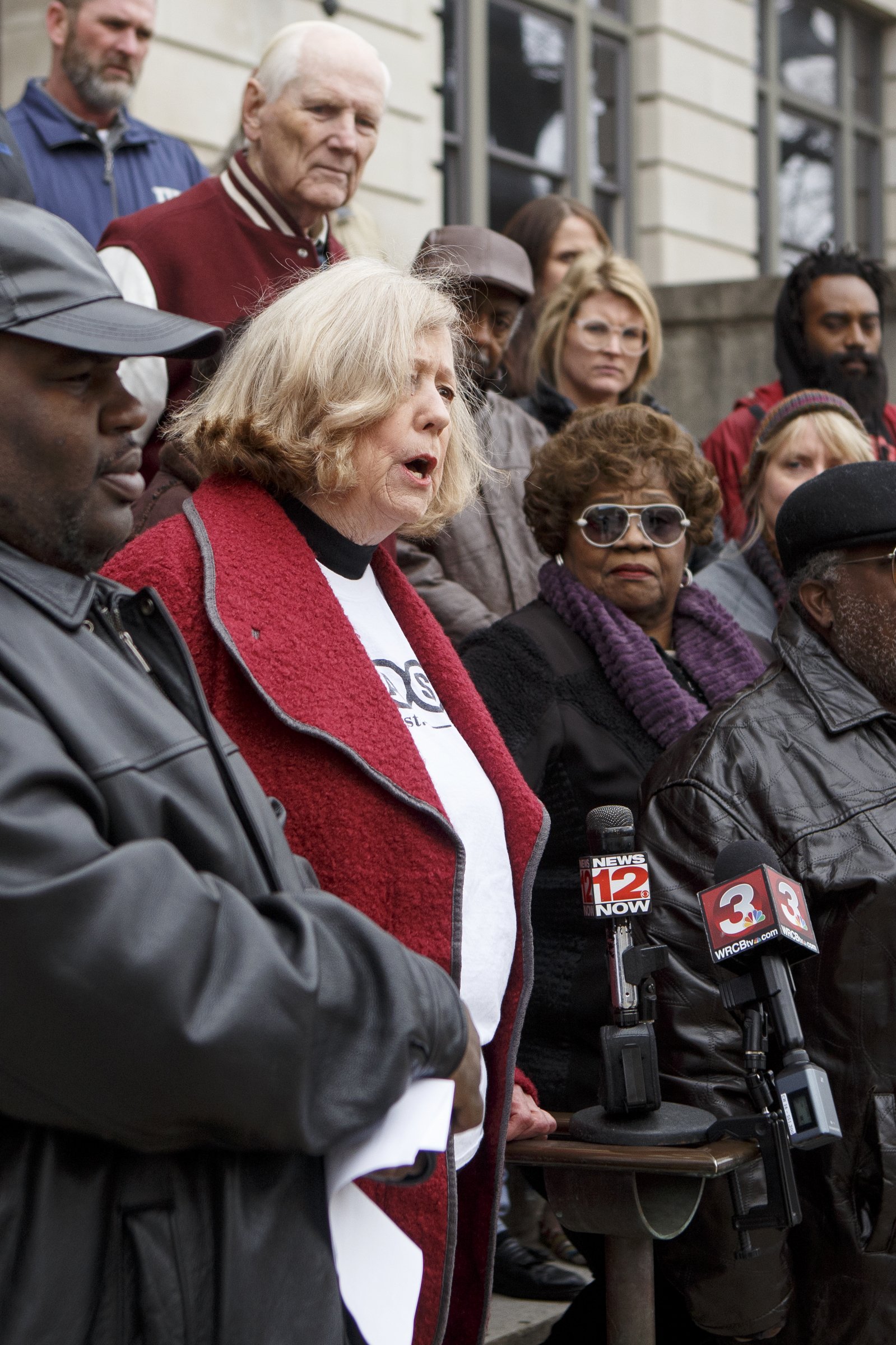 Unity Group of Chattanooga member and founder of Accountability for Taxpayer Money Helen Burns Sharp, red jacket, speaks during a public statement by the Unity Group of Chattanooga about the former Harriet Tubman site on the steps of City Hall on Tuesday, Dec. 4, 2018 in Chattanooga, Tenn.