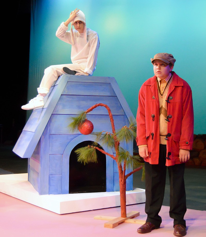 Snoopy, played by Lainey Maddox, finds Charlie Brown, played by Mason Brown, and his forlorn little Christmas tree completely hopeless in the Chattanooga Theatre Centre's production of "A Charlie Brown Christmas." (Taryn Bracher photo)