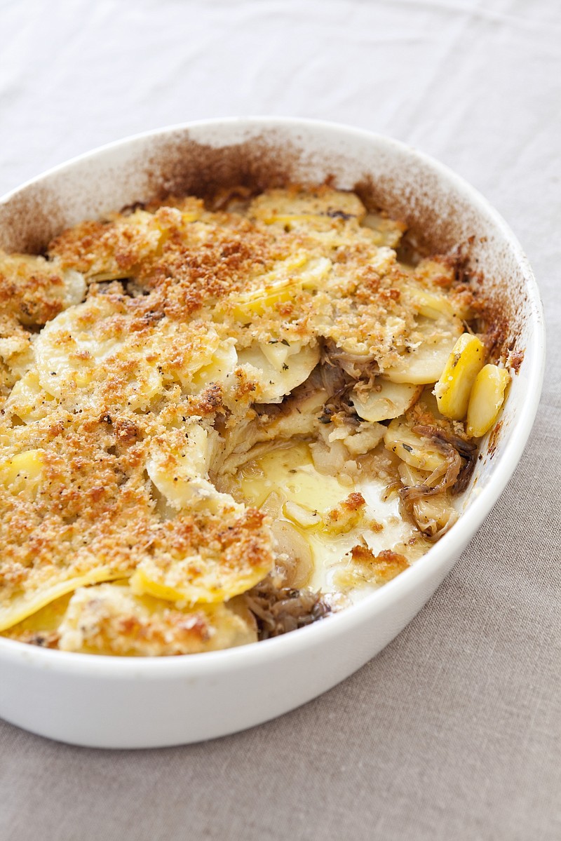 This undated photo provided by America's Test Kitchen in November 2018 shows potato gratin in Brookline, Mass. (Joe KellerAmerica's Test Kitchen via AP)