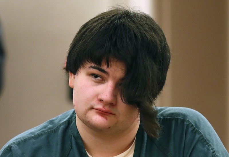 Andrea Balcer listens to testimony during the sentencing hearing for killing her parents, Tuesday, Dec. 4, 2018, at the Capital Judicial Center in Augusta, Maine. Balcer was 17 at the time of the Oct. 31, 2016, stabbings at their Winthrop home. The teenager told a police dispatcher that she "snapped" on the night of the stabbings. (AP Photo/Robert F. Bukaty)

