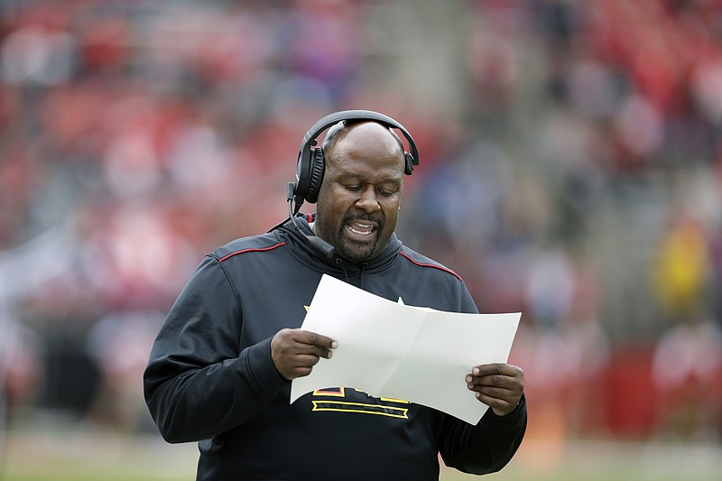 Mike Locksley, shown during a game against Rutgers in November 2015 while serving as Maryland's interim head coach, is headed back to Maryland as the Terrapins' full-time head coach. But first he has work left to do as the offensive coordinator at Alabama, which will face Oklahoma in a College Football Playoff semifinal on Dec. 29.