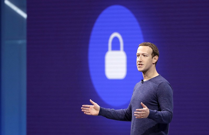  In this May 1, 2018, file photo, Facebook CEO Mark Zuckerberg makes the keynote speech at F8, Facebook's developer conference in San Jose, Calif. The British Parliament has released some 250 pages worth of documents that show Facebook considered charging developers for data access. The documents show internal discussions about linking data to revenue. "There's a big question on where we get the revenue from," Zuckerberg said in one email. "Do we make it easy for devs to use our payments/ad network but not require them? Do we require them? Do we just charge a rev share directly and let devs who use them get a credit against what they owe us? It's not at all clear to me here that we have a model that will actually make us the revenue we want at scale." (AP Photo/Marcio Jose Sanchez, File)