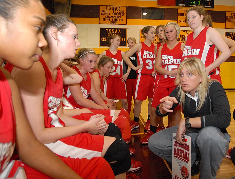 Copper Basin girls' basketball coach Amy Geren McGowan talks to her team during a game at Grace Academy in January 2008. McGowan was a standout player at Bradley Central, and she will be joined by former teammate Paige Redman and the late Alice Hancock in this year's Bearette Hall of Fame class, which will be inducted on Saturday.