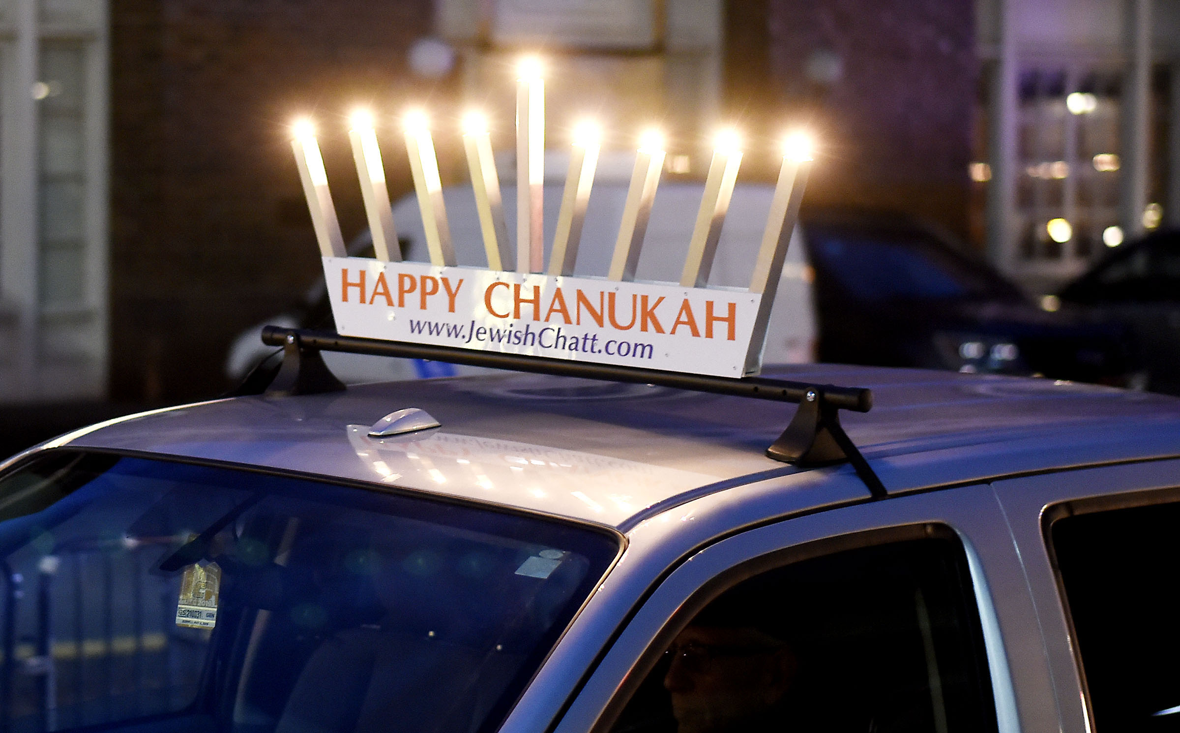A Menorah decorates a truck as it arrives at the Choo Choo. Chabad of Chattanooga celebrated Hanukkah with A Menorah topped car parade to the Choo Choo and the lighting of the Menorah at Ice on the Landing on December 6, 2018.