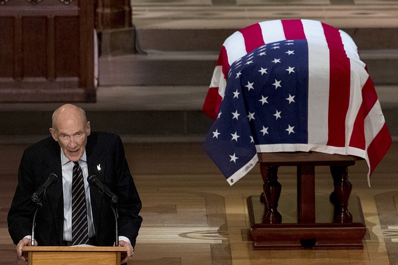 Former Sen. Alan Simpson, R-Wyo, speaks during the State Funeral for former President George H.W. Bush at the National Cathedral, Wednesday, Dec. 5, 2018, in Washington. (AP Photo/Andrew Harnik, Pool)