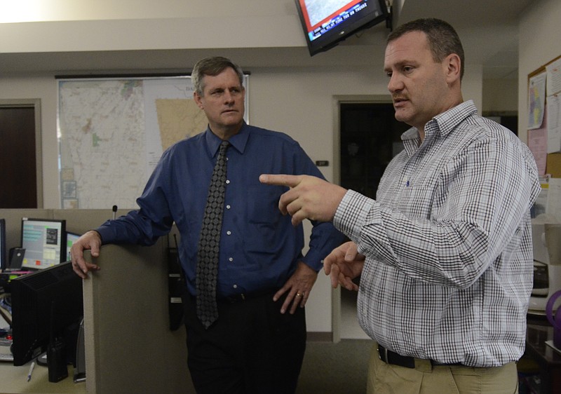 Dade County Schools Superintendent Shawn Tobin, left, and Dade County Emergency Services Director Alex Case talk at the Dade County 911 Center in this 2013 staff file photo.