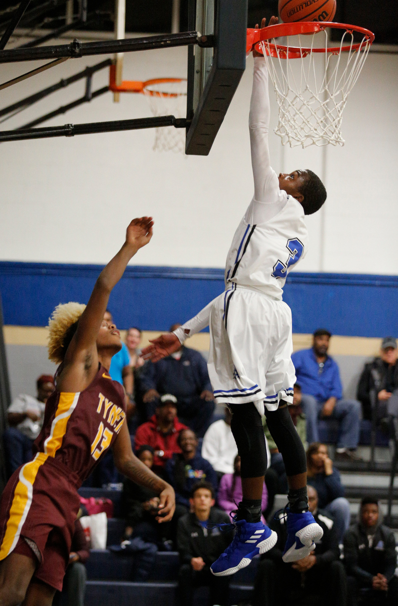 CSAS's Cahlib Edards shoots over Tyner's Xavier Fisher during their prep basketball game at Chattanooga School for the Arts and Sciences on Friday, Dec. 7, 2018, in Chattanooga, Tenn.