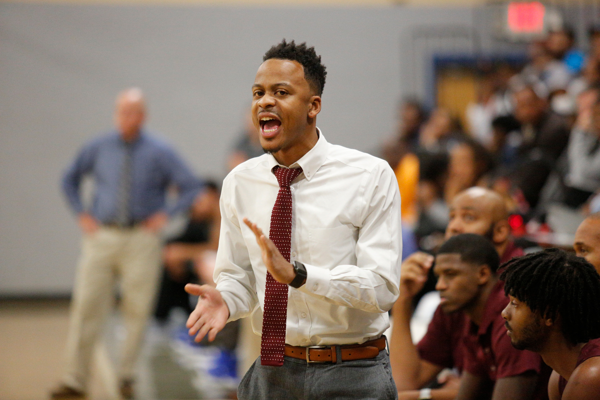 Tyner basketball coach E'jay Ward directs players during their prep basketball game at Chattanooga School for the Arts and Sciences on Friday, Dec. 7, 2018, in Chattanooga, Tenn.