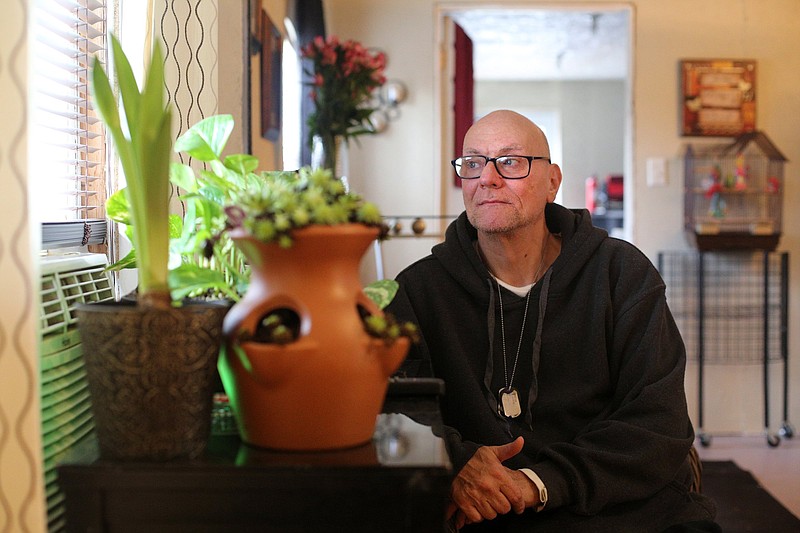 Bryant Ellis poses for a photo Thursday, December 6, 2018 at his Hixson, Tennessee, home. Prior to receiving assistance from the Neediest Cases fund and other charities, Ellis' home was a tin shell of a trailer with temporary power run from his brother's house next door.