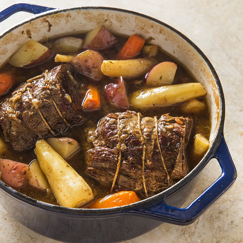 This undated photo provided by America's Test Kitchen in October 2018 shows Simple Pot Roast in Brookline, Mass. This recipe appears in the book "Cook it in Your Dutch Oven." (Joe Keller/America's Test Kitchen via AP)