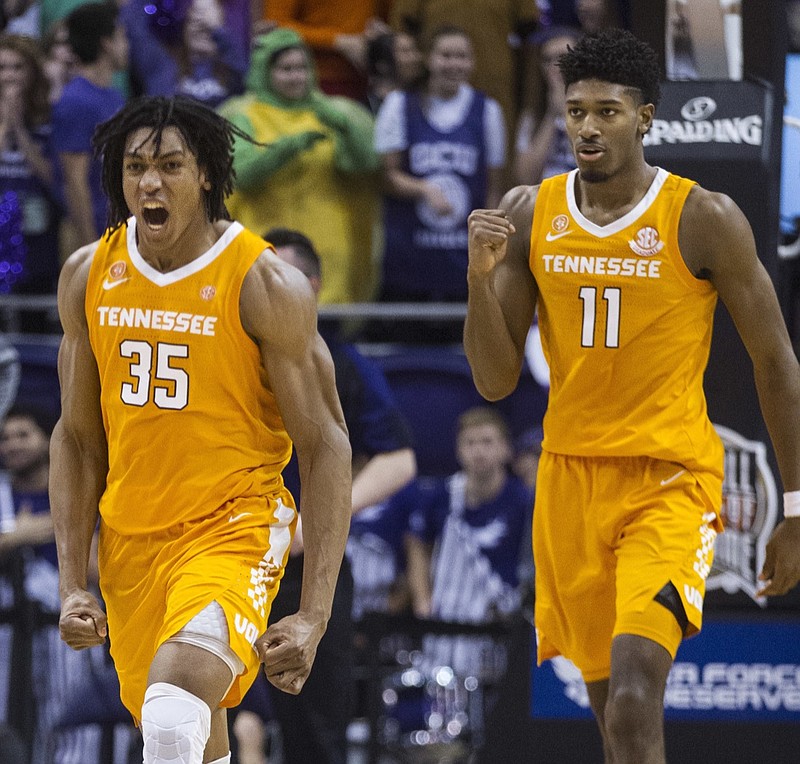 Tennessee's Yves Pons, left, and Kyle Alexander celebrate the Vols' win over then-No. 1 Gonzaga in Phoenix in early December.