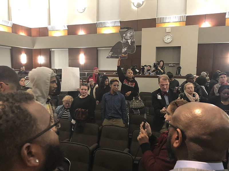 Chattanooga City Council members walked out mid-meeting Tuesday, Dec. 11, amid protests about a white Hamilton County detective seen in a video punching and kicking a handcuffed black man during an arrest.