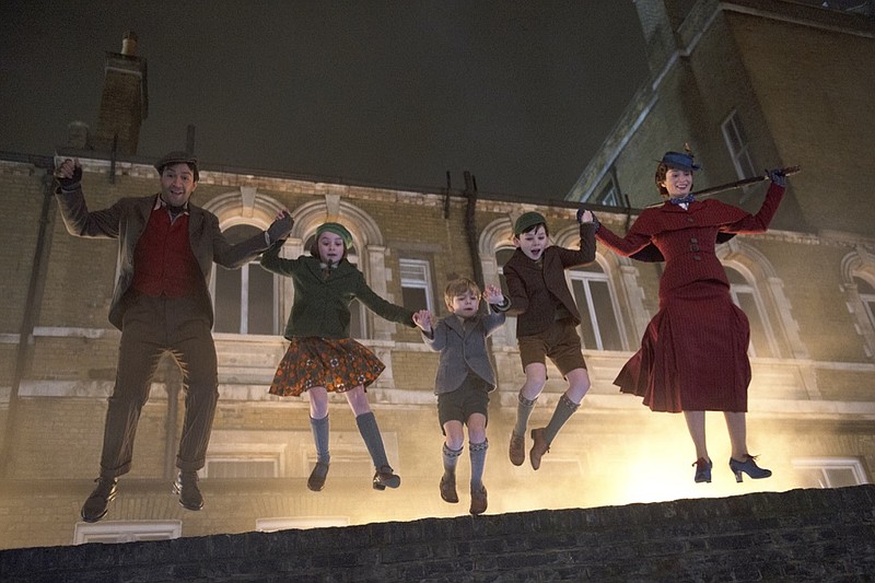 This image released by Disney shows, from left, Lin-Manuel Miranda, Pixie Davies, Joel Dawson, Nathanael Saleh and Emily Blunt in "Mary Poppins Returns." (Jay Maidment/Disney via AP)