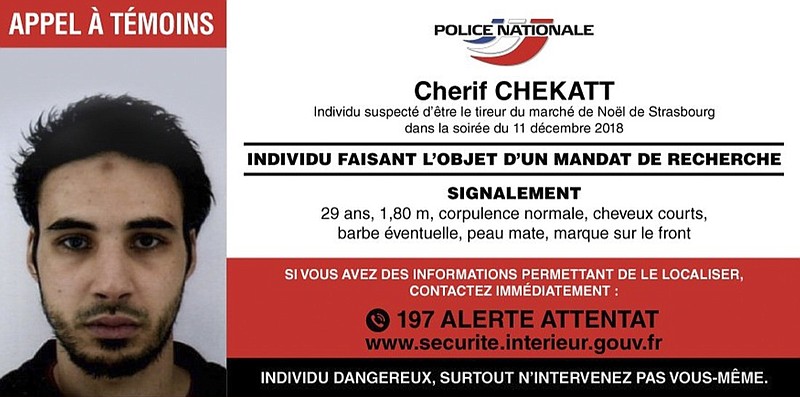 This photo provided Thursday, Dec. 13, 2018 by the National Police shows the wanted notice for Cherif Chekatt, the suspect in the Strasbourg attack. French security forces were trying to catch the suspected Strasbourg gunman dead or alive, an official said Thursday, two days after an attack near the city's Christmas market. More than 700 officers were involved in the manhunt for 29-year-old Cherif Chekatt. (Police Nationale via AP)