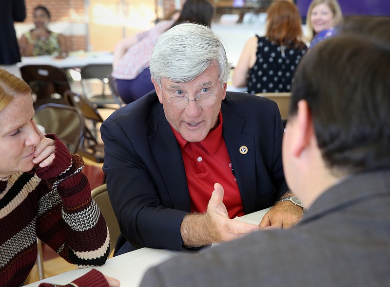 Sen. Todd Gardenhire, R-Chattanooga, speaks with others at his table during a visioning event for the new Howard Middle School Thursday, August 23, 2018 at Howard High School in Chattanooga, Tennessee. Many parents, students and teachers from schools in the Howard School feeder pattern attended the event as well as other concerned citizens.