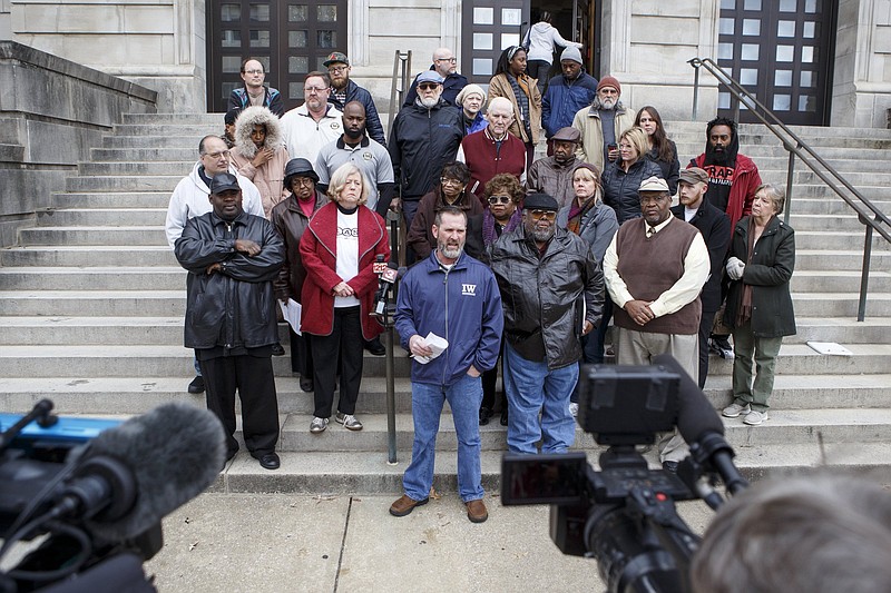 Organizer and President of Iron Workers Local Union No. 704 Daniel Potter, center, speaks during a public statement by the Unity Group of Chattanooga about the former Harriet Tubman site on the steps of City Hall on Tuesday, Dec. 4, 2018 in Chattanooga, Tenn.