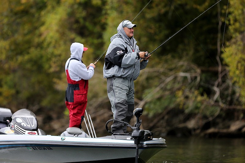 Michael Corbett and Steve Cornett fish from their boat during the Fishing League Worldwide Bass Fishing League Regional Championship tournament Thursday, October 25, 2018 held on Lake Chickamauga in Dayton, Tennessee. The goal of the anglers during the event was to catch the largest five fish they could each day.