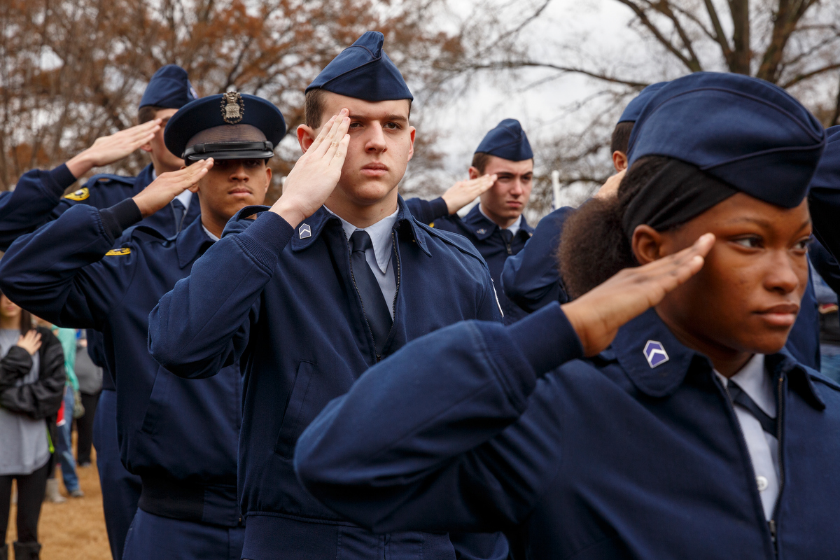 Staff photo by Doug Strickland / Members of the Hixson High School Air Force JROTC salute during a memorial ceremony at the Chattanooga National Cemetery on Saturday, Dec. 15, 2018, in Chattanooga, Tenn. Thousands of volunteers turned out to lay wreaths on graves at the cemetery which were donated by the Worcester Wreath Company through the Wreaths Across America program, which supplies wreaths to national cemeteries across the country.