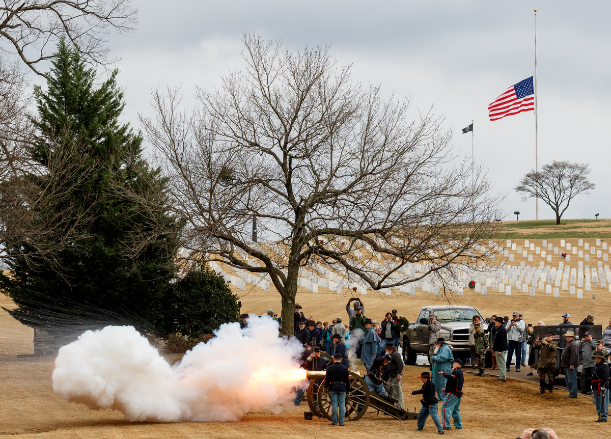 Staff photo by Doug Strickland / A cannon is fired during a memorial ceremony at the Chattanooga National Cemetery on Saturday, Dec. 15, 2018, in Chattanooga, Tenn. Thousands of volunteers turned out to lay wreaths on graves at the cemetery which were donated by the Worcester Wreath Company through the Wreaths Across America program, which supplies wreaths to national cemeteries across the country.