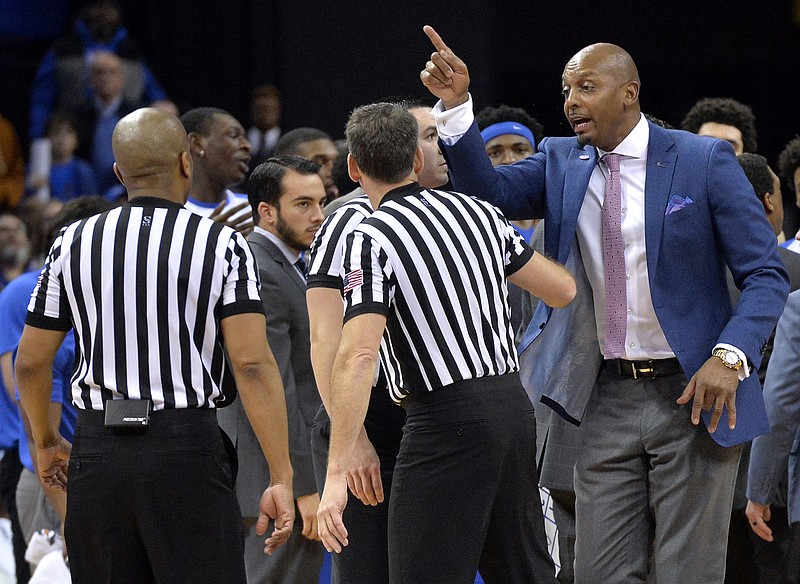 AP photo by Brandon Dill / Memphis men's basketball coach Penny Hardaway, right, reacts to a referee's call in the second half of a home game against Tennessee on Dec. 15, 2018.