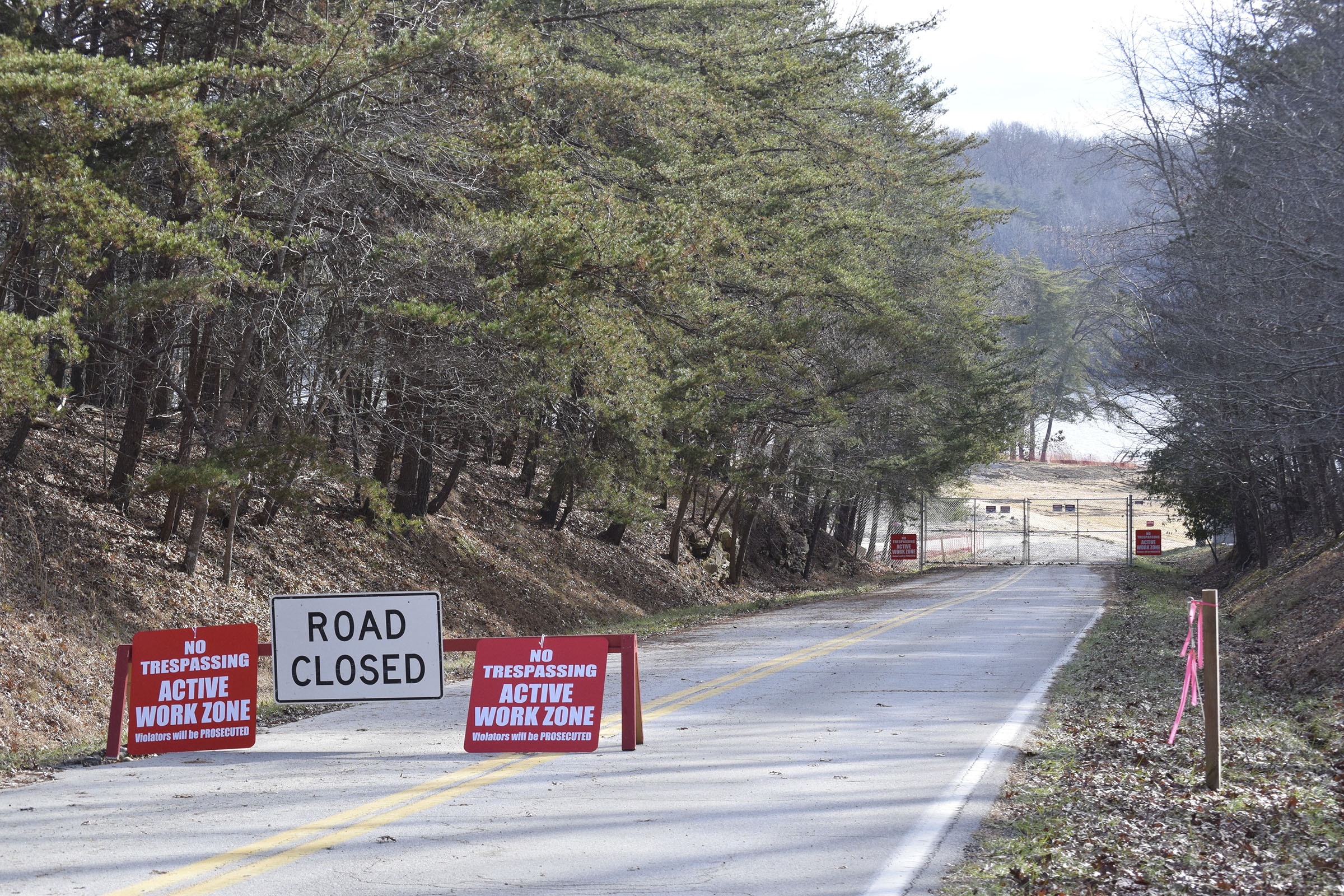 Signs and barricades greet anyone attempting to head into the former site of the Fall Creek Falls State Park Inn on Dec. 13, 2018.