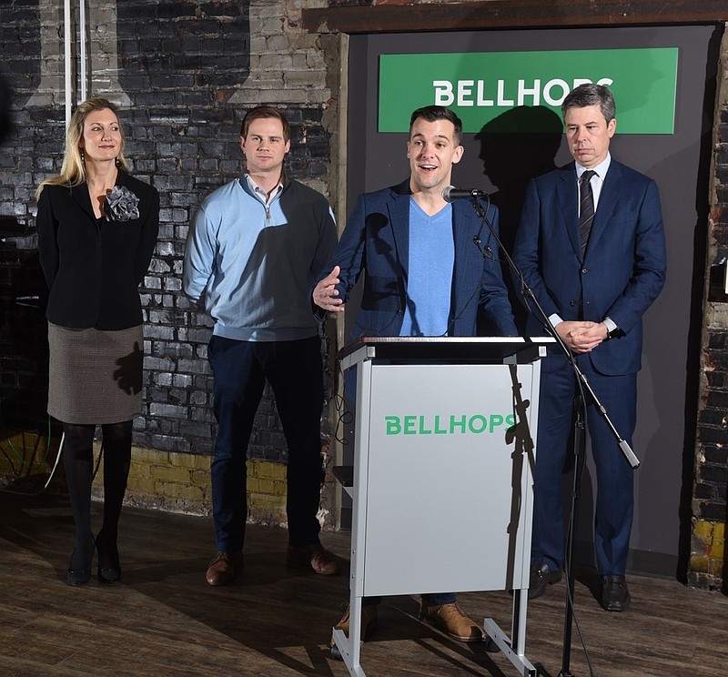 Bellhops CEO Luke Marklin announces expansion of the business at Warehouse Row, after raising $31 million. The expansion in Chattanooga will also include a new office in Atlanta. From left are, Christy Gillenwater, Chamber of Commerce CEO, Cam Doody, Bellhops President and Cofounder, Marklin and Mayor Andy Berke.