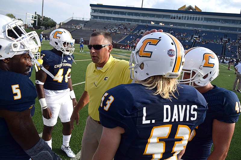 UTC linebacker coach Rusty Wright encourages his players before the game. The University of Tennessee/Chattanooga Mocs hosted the Shorter University Hawks in NCAA football action on Sept. 1, 2016.

