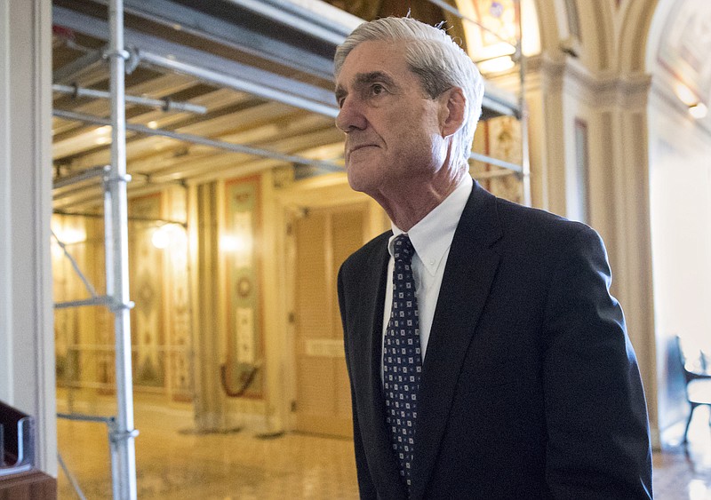 In this June 21, 2017 file photo, special counsel Robert Mueller departs after a closed-door meeting with members of the Senate Judiciary Committee about Russian meddling in the election and possible connection to the Trump campaign, on Capitol Hill in Washington. (AP Photo/J. Scott Applewhite, File)