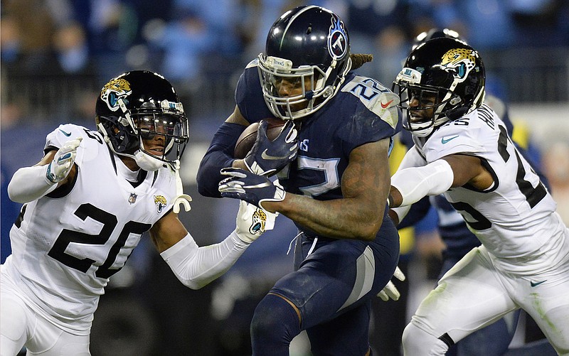 Tennessee Titans running back Derrick Henry runs for a touchdown during his team's 30-9 win over the Jacksonville Jaguars on Dec. 6 in Nashville. Henry rushed for a franchise-record 238 yards that day and ran for 170 more yards in this past Sunday's road win against the New York Giants to keep the Titans in the playoff hunt.