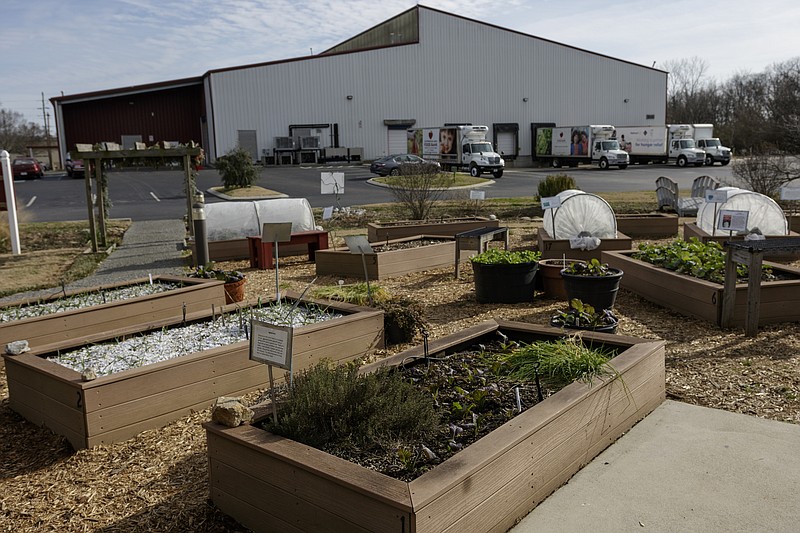 A vegetable garden is seen behind the Chattanooga Area Food Bank, which was formerly the location of an EPA superfund site, on Wednesday, Dec. 27, 2017, in Chattanooga, Tenn. The EPA has declared the Chattanooga area's superfund sites as safe.